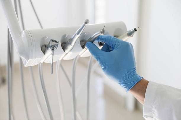 Professional Tooth Extraction technician working in Bass Lake, IN